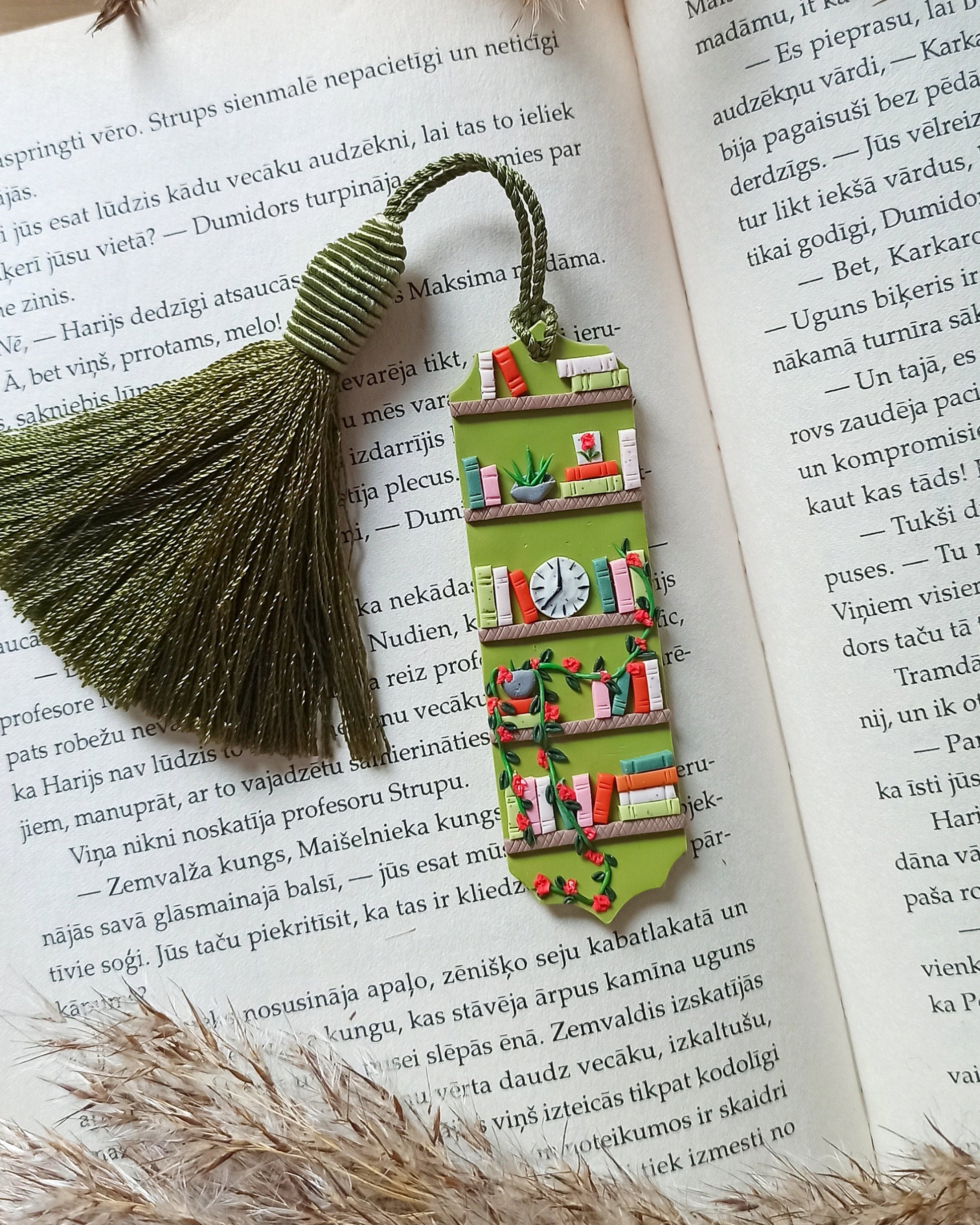 Green tassel bookmark: Handmade polymer clay book mark with small books and plants