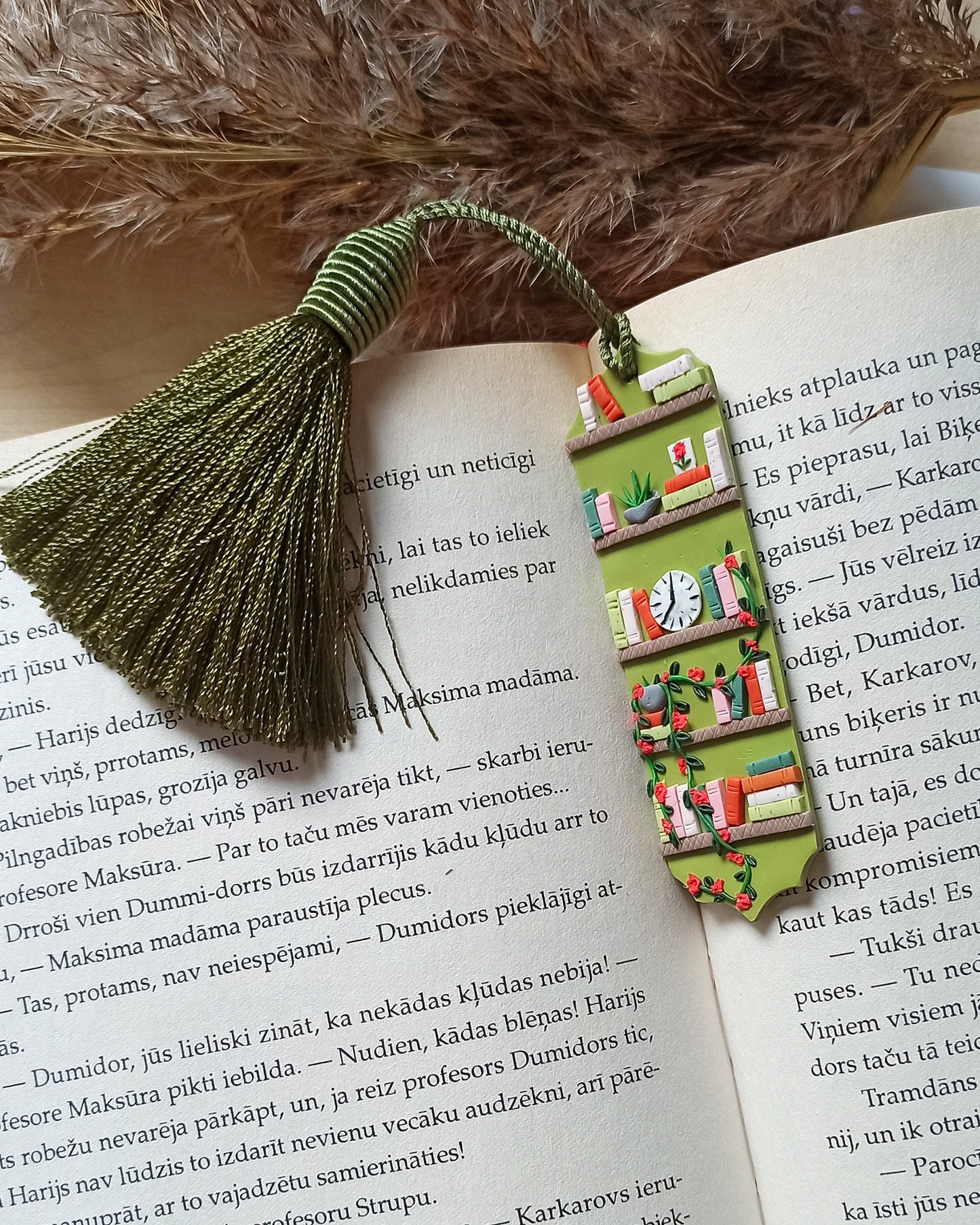 Green tassel bookmark: Handmade polymer clay book mark with small books and plants