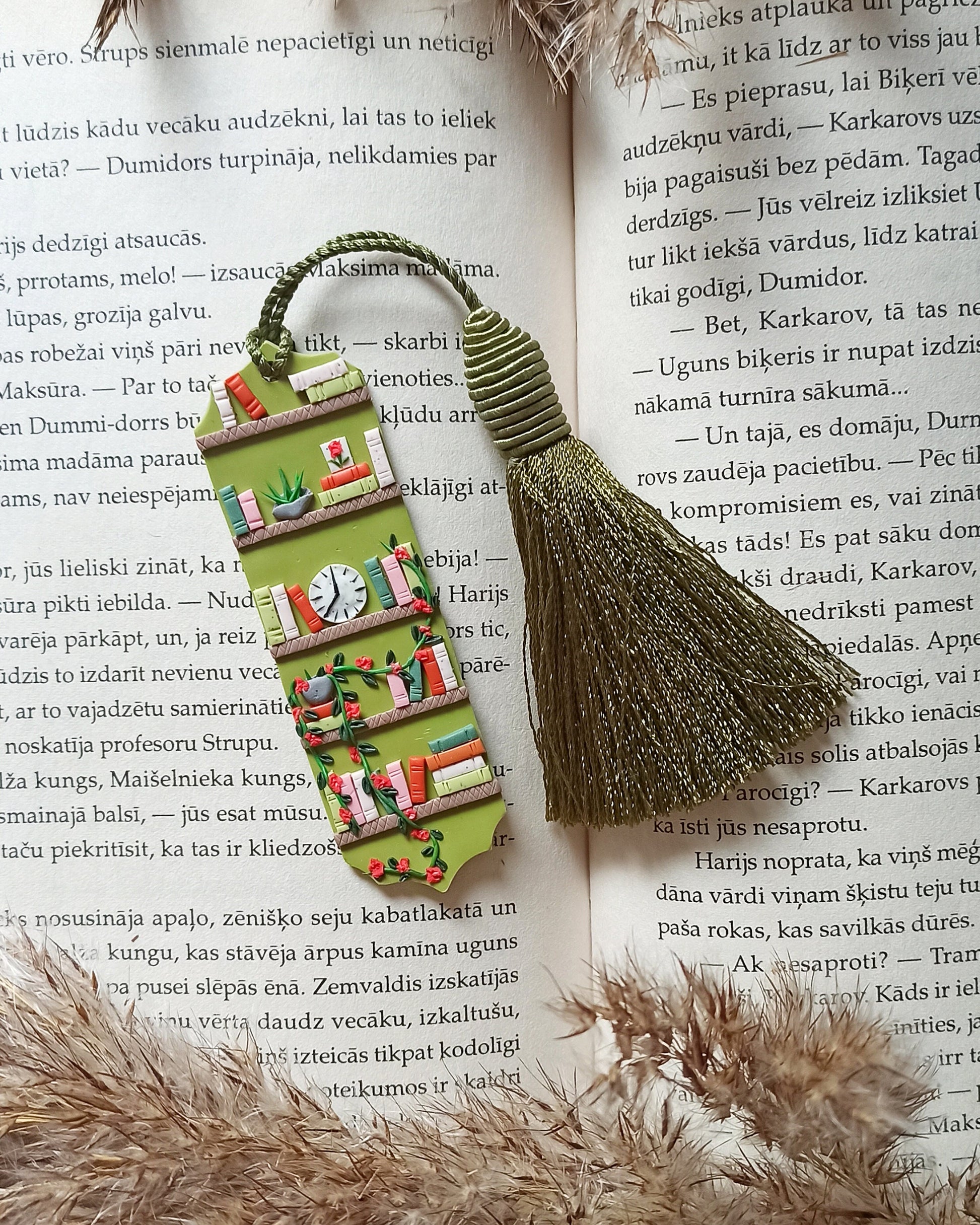 Green tassel bookmark: Handmade polymer clay book mark with small books and plants