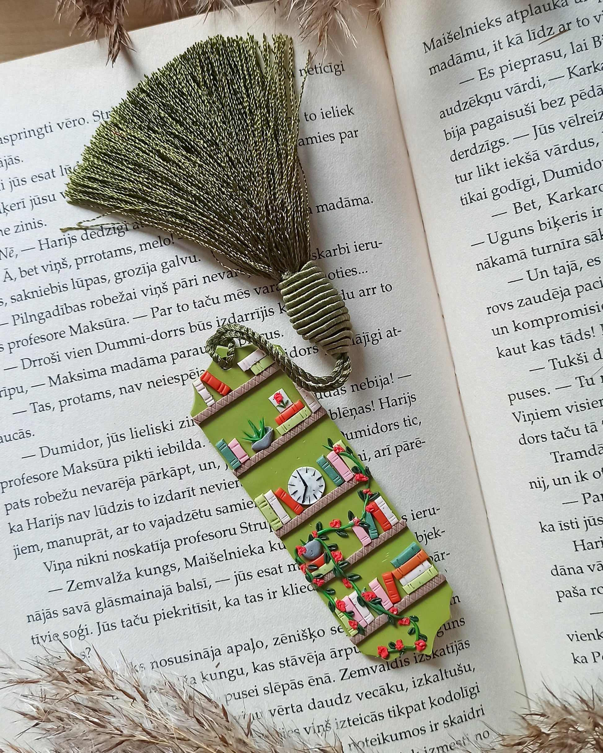 Green tassel bookmark: Handmade polymer clay book mark with small books and plants