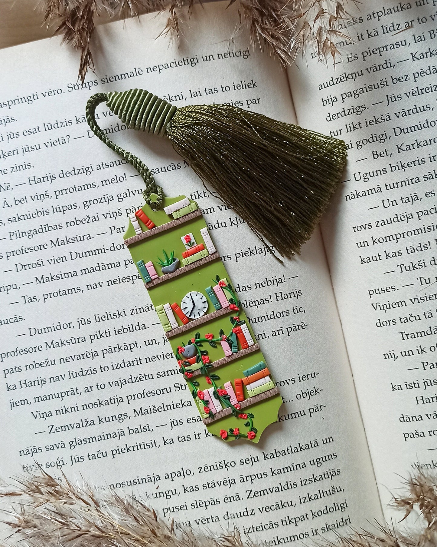 Green tassel bookmark: Handmade polymer clay book mark with small books and plants
